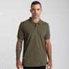 A men's polo shirt in olive green with a collar, short sleeves, and a fitted design. It features a logo.