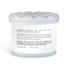 A white fragrance pot with a light blue base, featuring a floral design on the lid and an ingredient label.