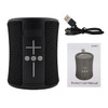 A black portable speaker with control buttons, a USB cable, and a user manual. The speaker has a textured surface.