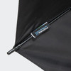 A black umbrella featuring a logo, with a sturdy handle and a sleek design.