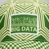 A cap featuring a green and yellow geometric pattern with a patch. The cap has a logo on the front.