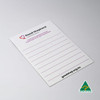 A white magnetic whiteboard featuring lined sections and a logo in the corner. It has a smooth, glossy finish.