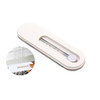 A white smartphone strap with a sliding mechanism, featuring a circular button and an opening to attach to devices.