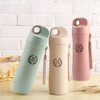 A drink bottle set featuring three colours: green, beige, and pink, with a logo and a side clip for convenience.