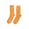A pair of orange socks featuring a repeating pattern of various animal shapes and a logo.