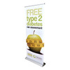 A roll-up banner featuring an apple and a measuring tape, predominantly in green and white, with a logo at the bottom.