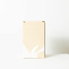 A drink cooler in a light brown box, featuring a simple design and a logo.