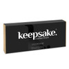 A boxed set of Keepsake Luca Salad Servers with a black and gold design, featuring a logo on the packaging.