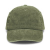 A vintage washed cap in olive green with a curved brim and a logo on the front.