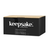 A coffee mug set packaging featuring a black box with a logo, designed for Keepsake Moda.