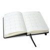 A5 daily diary for 2027 with a black cover, featuring blank monthly calendar pages and a bookmark ribbon.