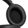 Black over-ear headphone cushion with a soft finish and a sleek design. Features a logo on the ear cup.
