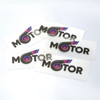 A selection of clear stickers featuring the word "MOTOR" and a graphic of a stylised motor icon.