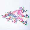 A collection of colourful stickers featuring floral and butterfly designs, displayed against a white background.