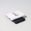 A white and black powerbank stacked together, featuring a logo and multiple USB ports.
