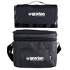 A black and grey cooler bag with a matching picnic blanket on top, featuring a logo.