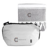 A grey cooler bag with a zipper and a matching grey towel featuring tassels. Both items have a logo.