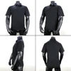 A black polo shirt displayed from multiple angles, featuring short sleeves and a collar. It has a logo on it.
