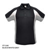 A black, white, and grey polo shirt featuring a contrasting design and a collar, with a logo on the front.