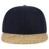 A black and cork snapback cap featuring a mid-profile design and a logo on the front.