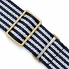 A navy and white striped belt featuring a gold buckle and silver metal detailing.