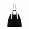 A black tote bag with a drawstring closure, featuring a front pocket and dual straps in a contrasting colour.