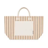 A large tote bag featuring horizontal stripes in beige and cream, with a solid pocket and handles.