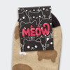 Pixel knitted ankle socks in beige with a playful cat design, featuring a black and white card with a cat theme and logo.