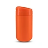 An orange coffee cup with a lid, featuring a smooth finish and a sleek design. It has a branding logo on it.