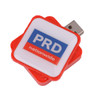 A square red flash drive with a white top featuring a logo. The drive has a USB connector.