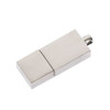 A silver flash drive with a sleek, minimalist design, featuring a metallic finish and a subtle logo.