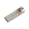 A silver flash drive with a sleek design and a circular hole at one end, featuring a logo.