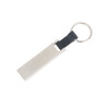 A silver mini flash drive keychain with a black leather strap and a metal ring.