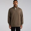 A man wearing a brown half zip crew jumper with long sleeves and a zipper collar. The product has a logo.