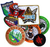 A collection of woven patches in various colours, featuring different designs and a logo, arranged on a white background.