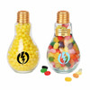 A drink bottle shaped like a bulb, featuring a gold lid and filled with colourful jelly beans and yellow candies.