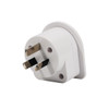 A white travel adapter with three prongs, featuring a round shape and a small branding logo.