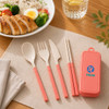 A coral-coloured travel utensils set featuring a spoon, fork, knife, and chopsticks, stored in a matching case.