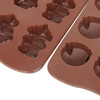 Custom shaped moulded ice cube tray featuring brown silicone, with various animal and object designs.