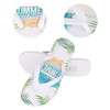 EVA thongs in white feature a tropical print with palm leaves and beach themes. Includes branding on the sole.