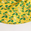 A yellow RPET bucket hat featuring a tropical leaf and floral pattern, with a logo detail.