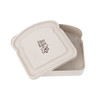 A portable lunch box in a light beige colour, featuring a bread-shaped design and a logo.