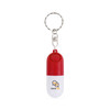 A red and white pill capsule keychain featuring a silver keyring and a logo on the surface.