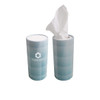 A blue geometric tissue dispenser with tissues partially pulled out, featuring a logo on the side.