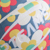 A colourful PU basketball featuring a vibrant floral design and textured surface. It has a logo present.