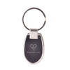 A sleek silver keyring with a rounded shield shape, featuring a logo on a black background.