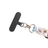 An adjustable phone lanyard featuring a colourful design and a metal clip for attachment. It has a textured black strap.