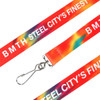A sublimation lanyard featuring a vibrant red and multicoloured design, with a metal clip for attachment.