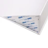 A small foldable white magnetic box with a ribbon and a 3M double-sided tape at the corner.