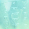 A transparent silicone storage pouch with measurement markings up to 1500ml and a logo.